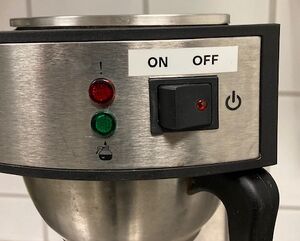 Coffee pot in the machine