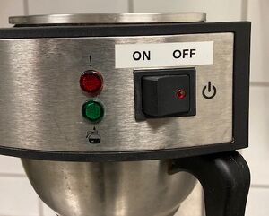 5. Attach the filter pan to the machine.
