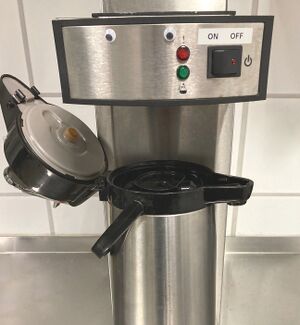 Coffee pot in the machine